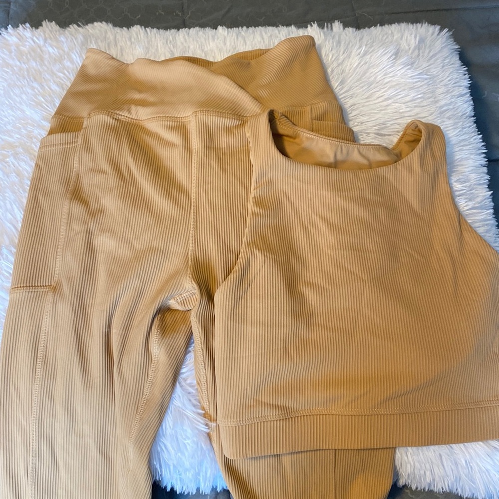 2 piece workout set tan color size S pants come w pockets shirt has bra padding
